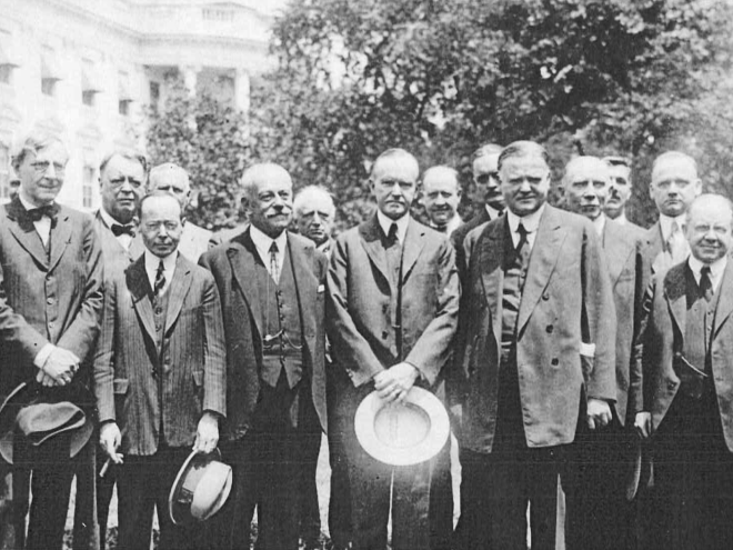 Founders of the American Arbitration Association met with President Calvin Coolidge and Secretary of Commerce Herbert Hoover on the White House lawn following the enactment of the U.S. Arbitration Act in 1925